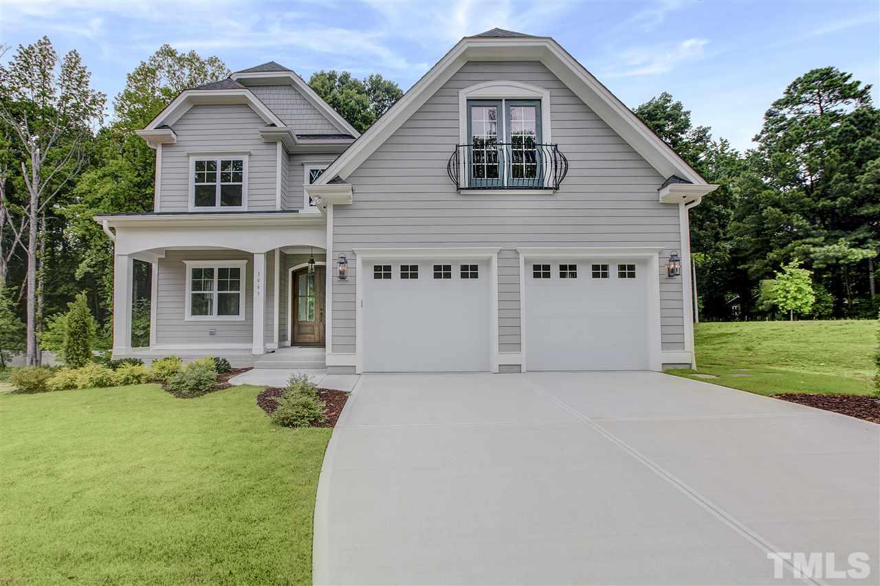 3061 Eden Harbor Court Raleigh, NC 27613 - Photo 1 of 30 a front view of a house with garden