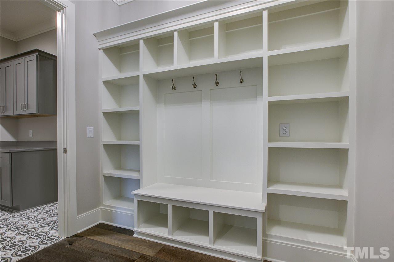 3061 Eden Harbor Court Raleigh, NC 27613 - Photo 6 of 30 a view of a room with rack on the wall