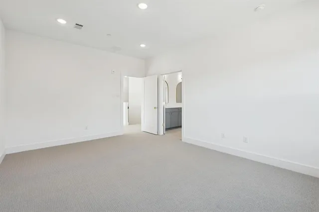 a bathroom with a sink toilet a mirror and shower