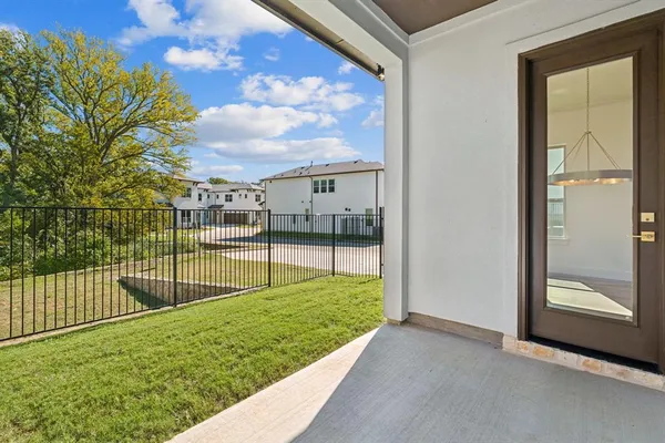 a view of backyard with green space