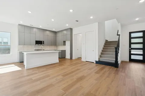 an aerial view of a house with a swimming pool