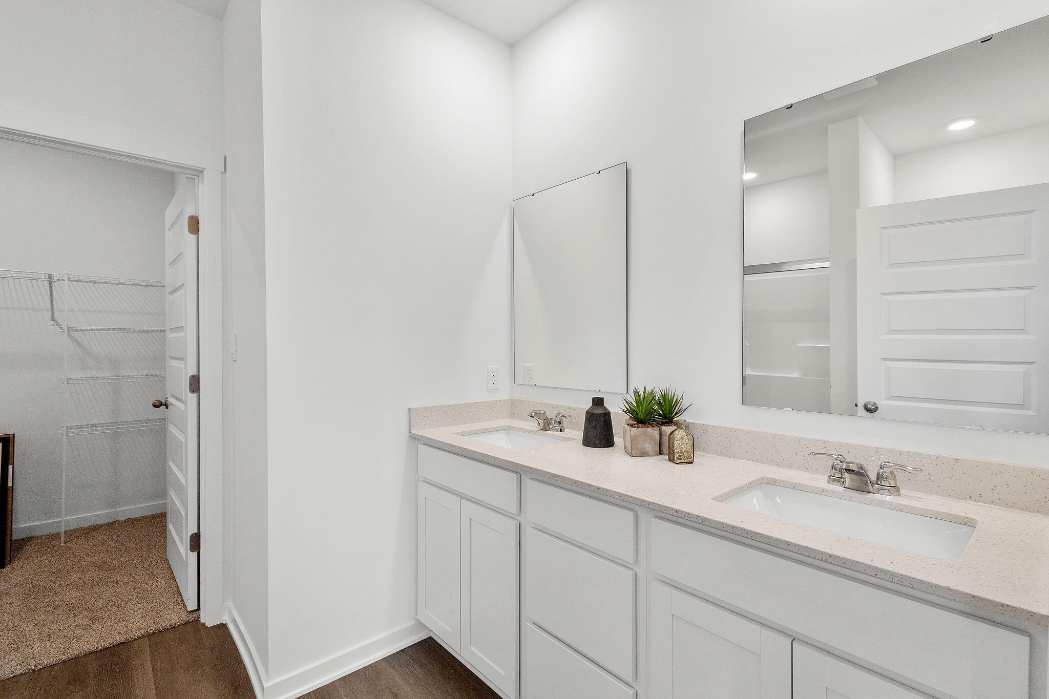 7486 East 116th Place Crown Point, IN 46307 - Photo 12 of 25 a bathroom with a sink and a mirror