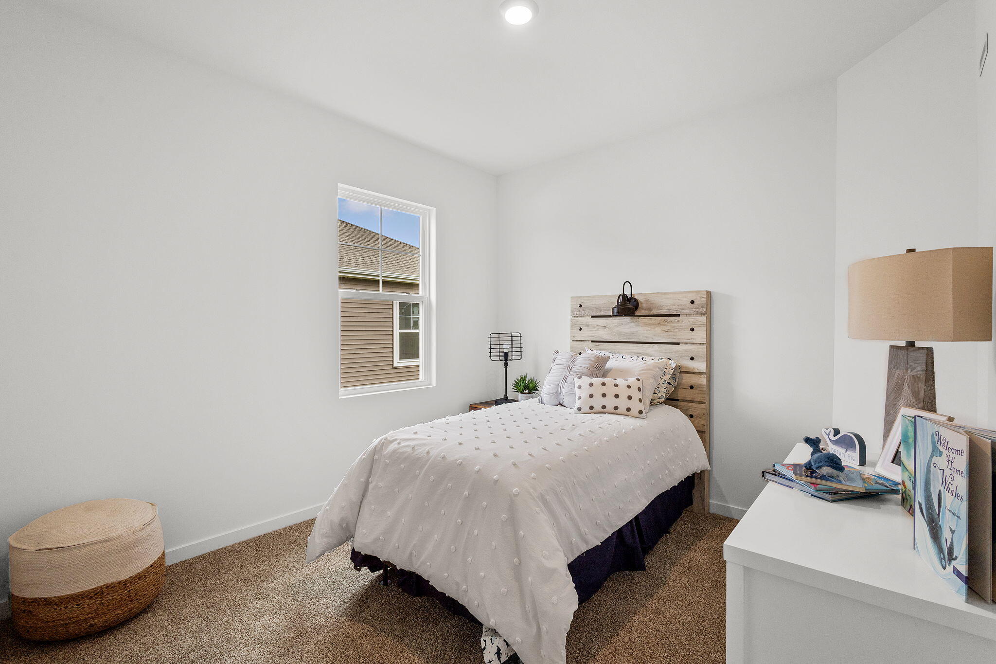 7486 East 116th Place Crown Point, IN 46307 - Photo 18 of 25 a bedroom with a bed and a lamp