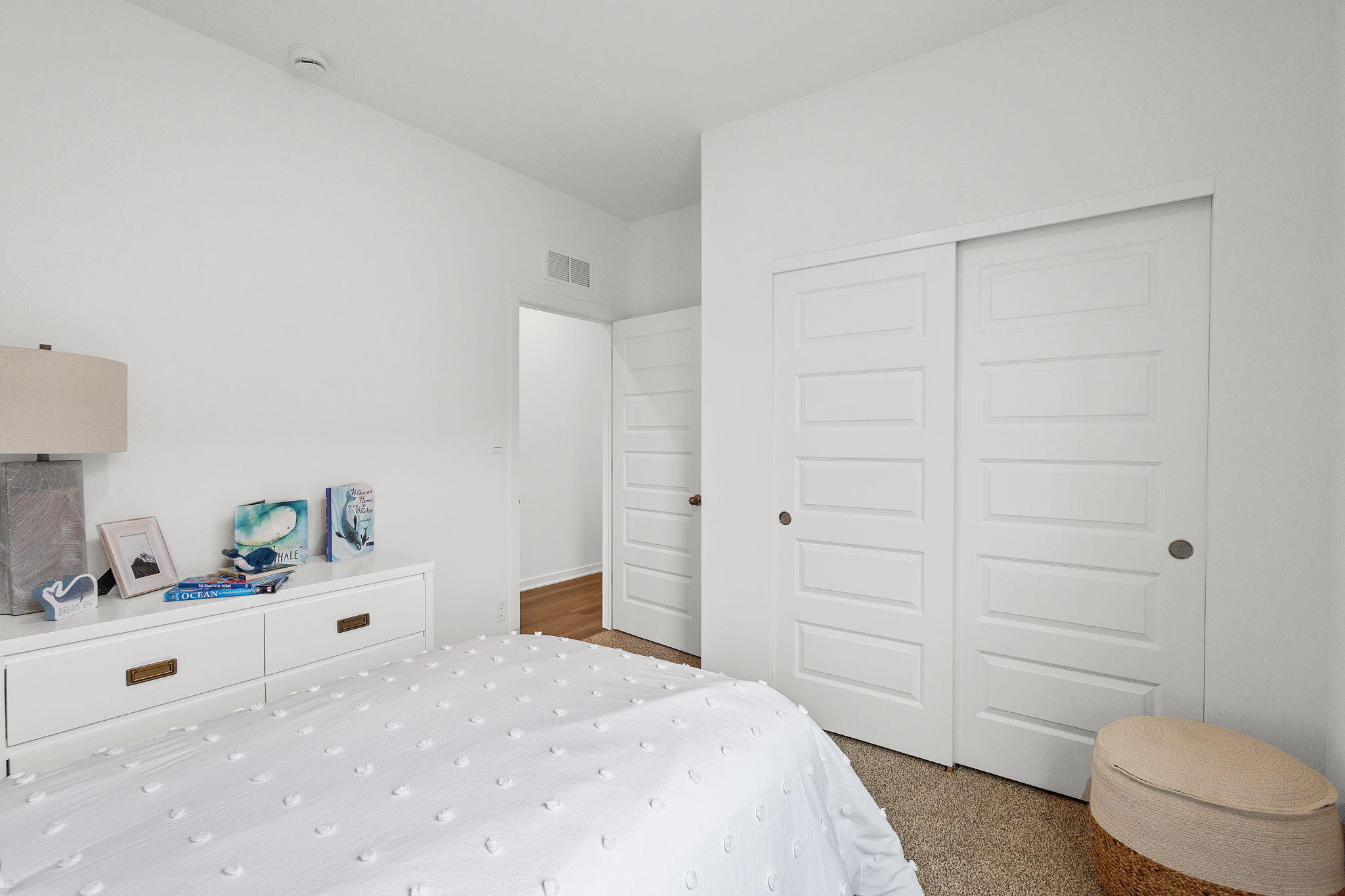 7486 East 116th Place Crown Point, IN 46307 - Photo 19 of 25 a bedroom with a bed and a dresser