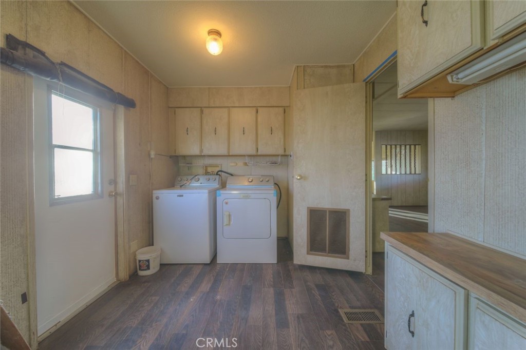 52565 Wheeler Road Anza, CA 92539 - Photo 21 of 54 a utility room with wooden floor washer and dryer