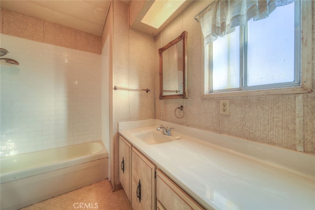 52565 Wheeler Road Anza, CA 92539 - Photo 33 of 54 a bathroom with a tub sink and mirror