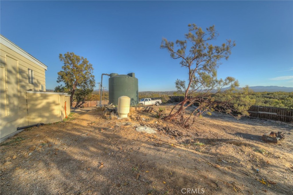 52565 Wheeler Road Anza, CA 92539 - Photo 8 of 54 a vase of flowers sitting on a table