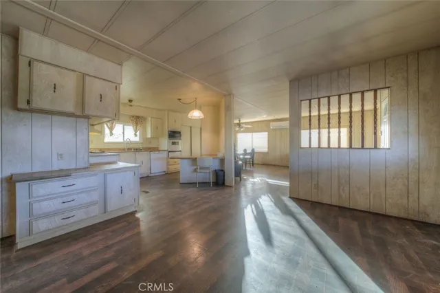 a view of a kitchen with furniture and a fireplace
