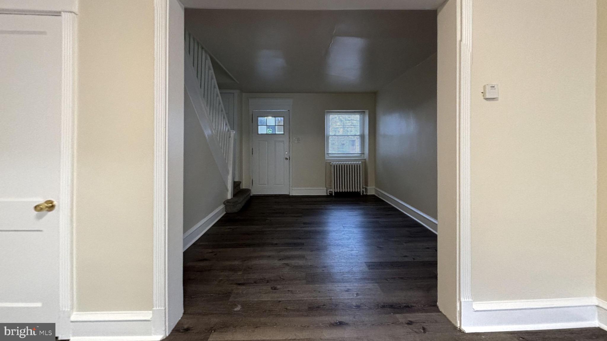 7246 Lamport Road Upper Darby, PA 19082 - Photo 1 of 10 a view of a hallway with wooden floor