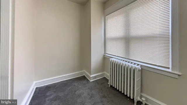 a view of a room with a window