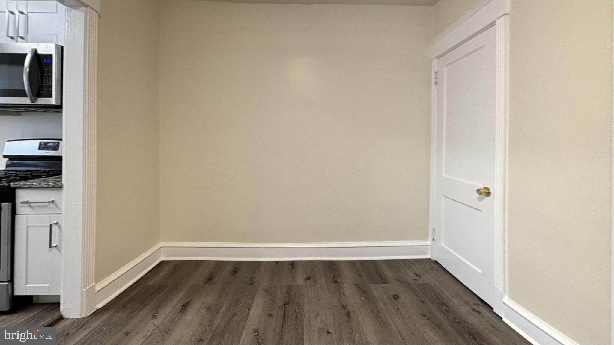 7246 Lamport Road Upper Darby, PA 19082 - Photo 10 of 10 a view of a room with wooden floor and a window