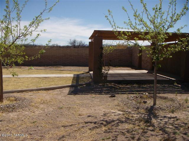 940 Paseo Escoba Rio Rico, AZ 85648 - Photo 22 of 25 a view of a two tub next to a yard