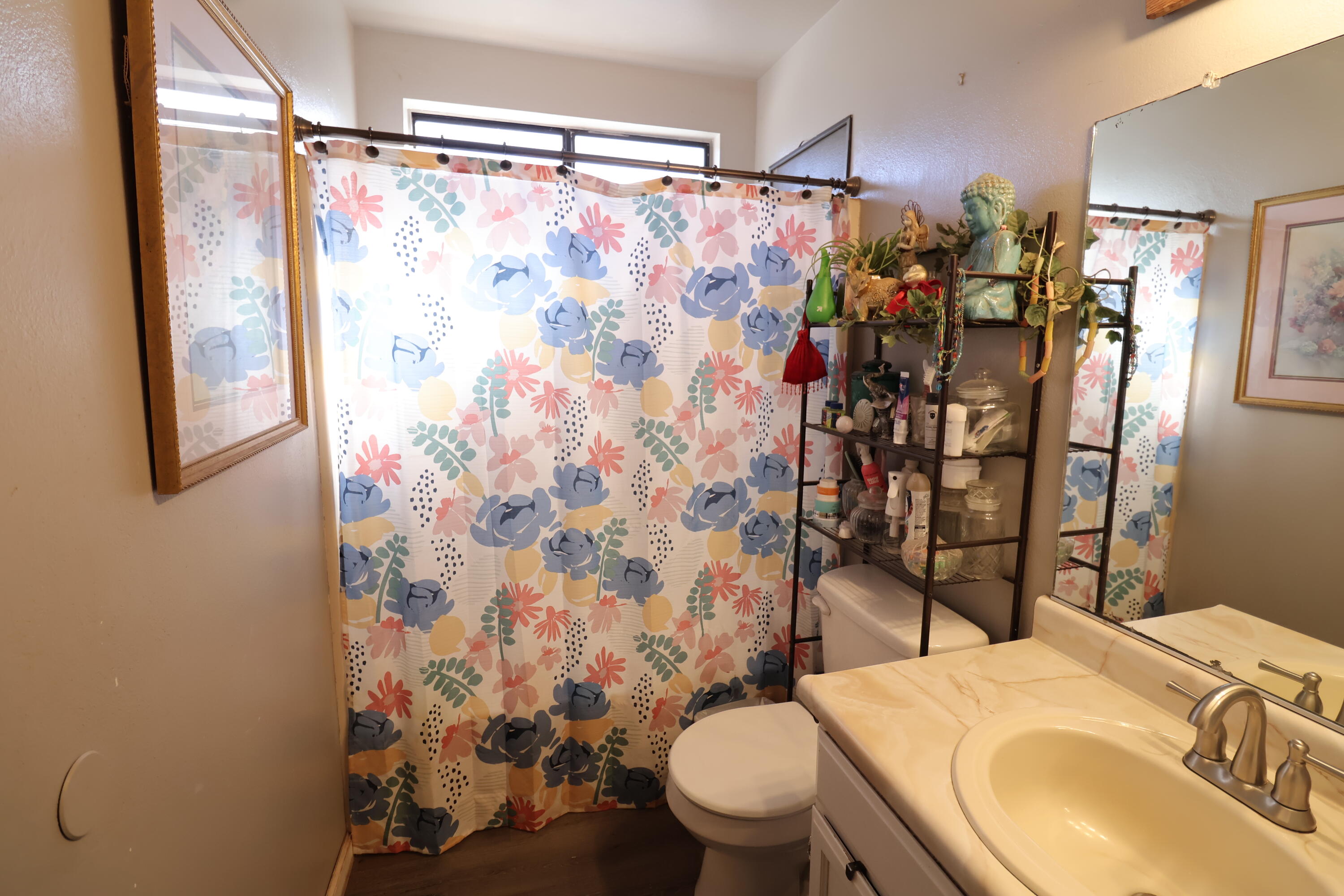 3528 Silverwood Street Redding, CA 96002 - Photo 12 of 13 a bathroom with a sink toilet and shower