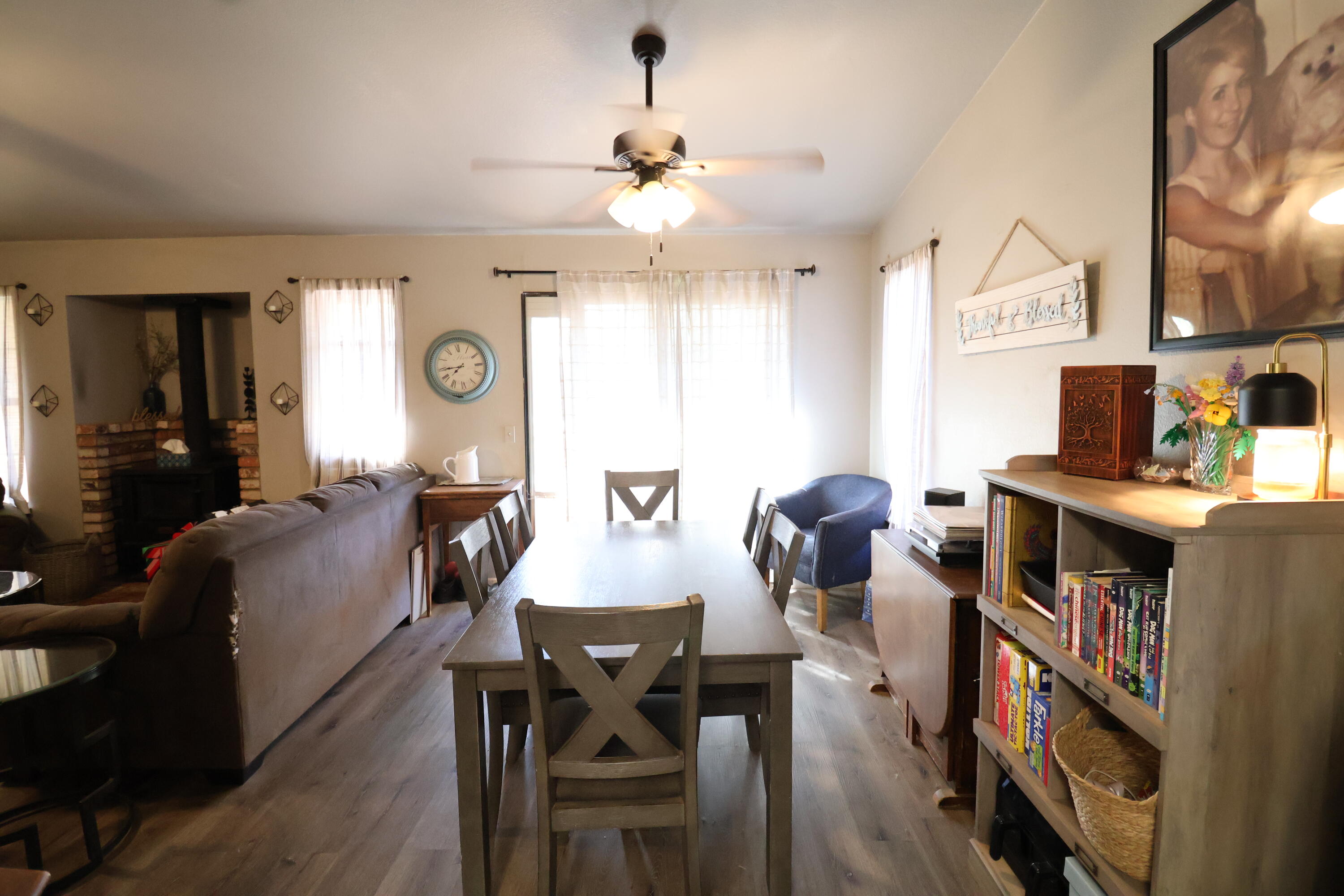 3528 Silverwood Street Redding, CA 96002 - Photo 4 of 13 a dining room with furniture and wooden floor