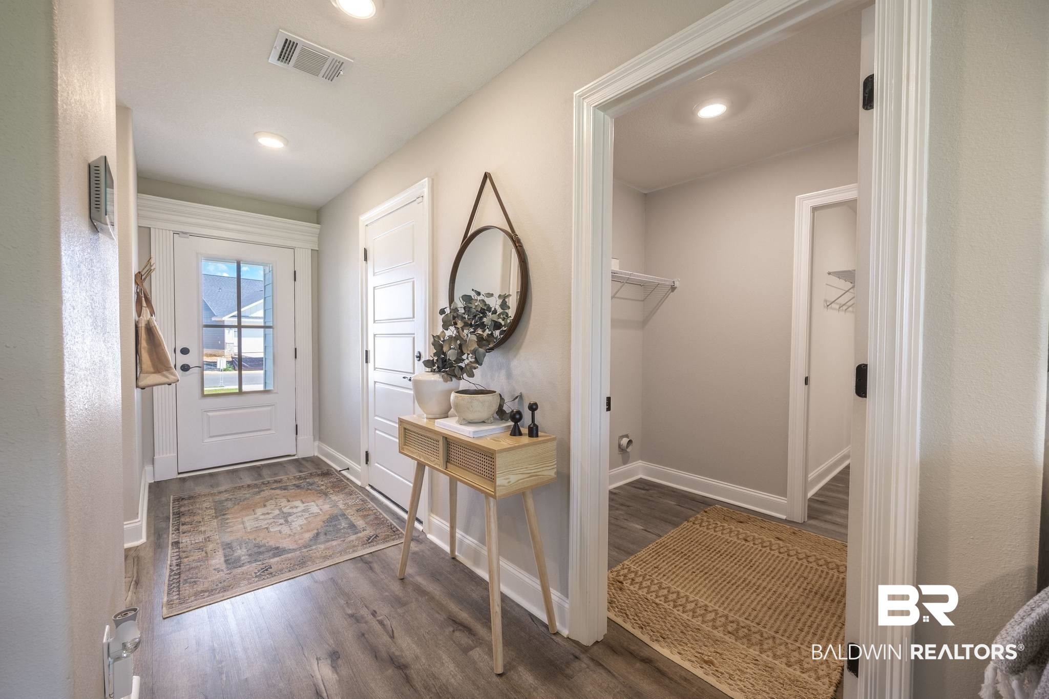 12918 Flanagan Street Elberta, AL 36530 - Photo 8 of 33 Entryway featuring wood-finish flooring, recessed lighting, and a paneled glass-insert front door