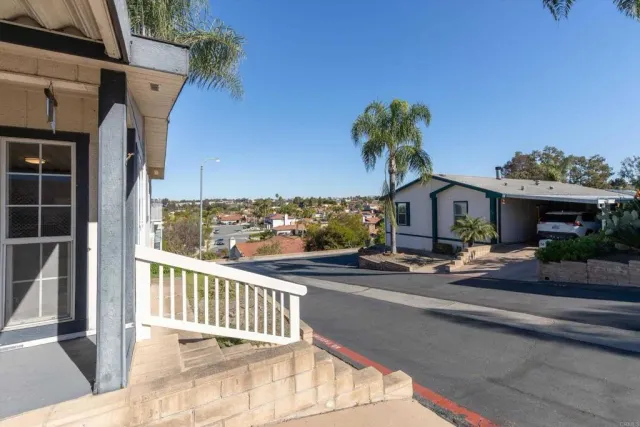 a front view of a house with street