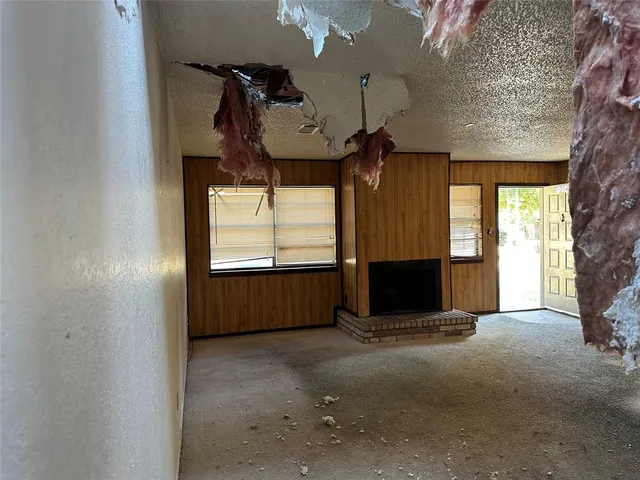 a view of a livingroom with furniture and window