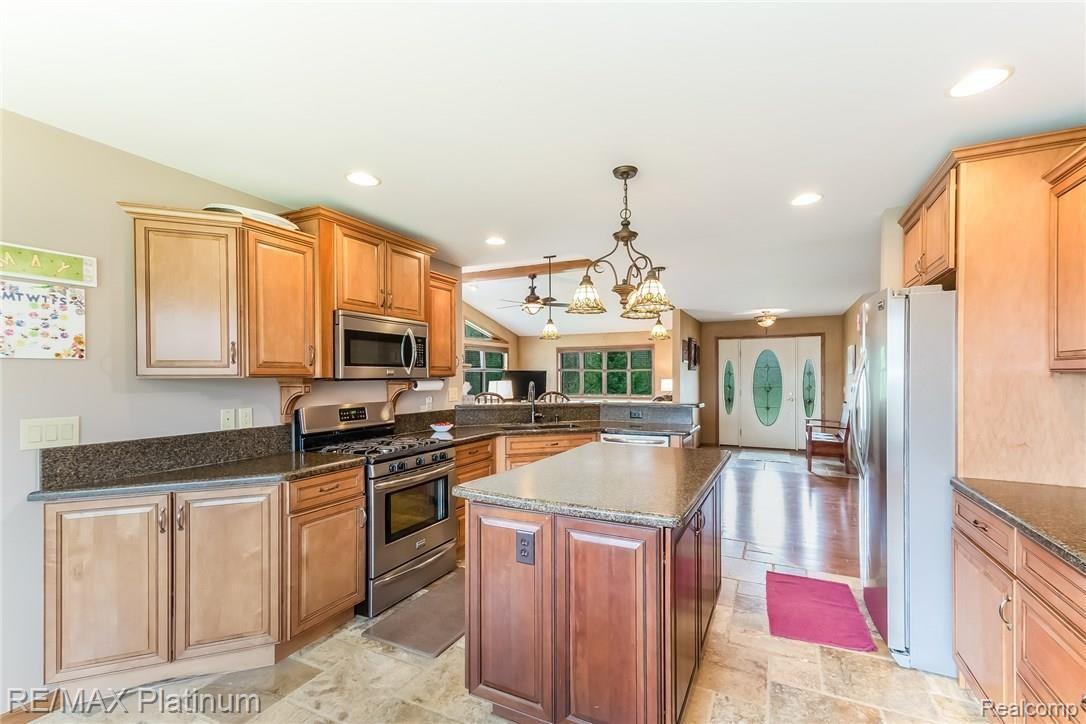 4558 North Latson Road Howell, MI 48855 - Photo 3 of 46 Island Kitchen Open to Living Rm and Front Entry