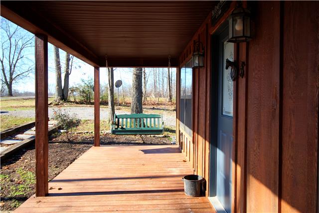 4705 Cole Ridge Road Beechgrove, TN 37018 - Photo 17 of 20 Beautiful front porch with plenty of room for relaxing. Swing does not stay.