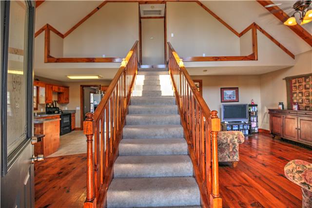4705 Cole Ridge Road Beechgrove, TN 37018 - Photo 4 of 20 Welcome to the beautiful entry of the house, with a nice stair case to bedrooms upstairs, open living with kitchen/eating to the left and the living room to the right.