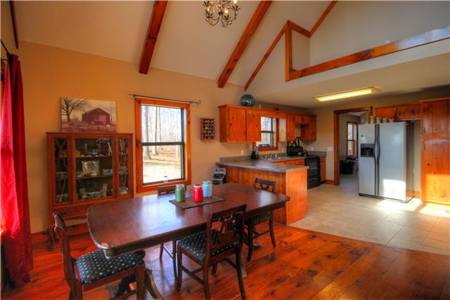 4705 Cole Ridge Road Beechgrove, TN 37018 - Photo 5 of 20 Very nice open kitchen and eating area with natural light. Kitchen leads to the huge laundry and utility room.