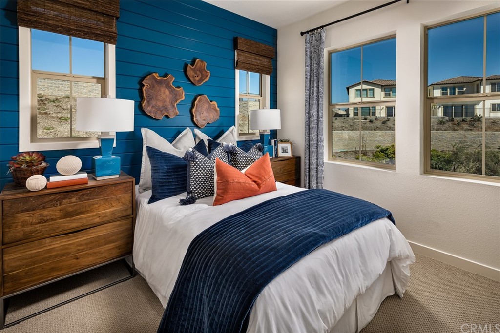 422 Coyote Pass Blanchard, ID 83804 - Photo 7 of 7 a bedroom with a bed and window