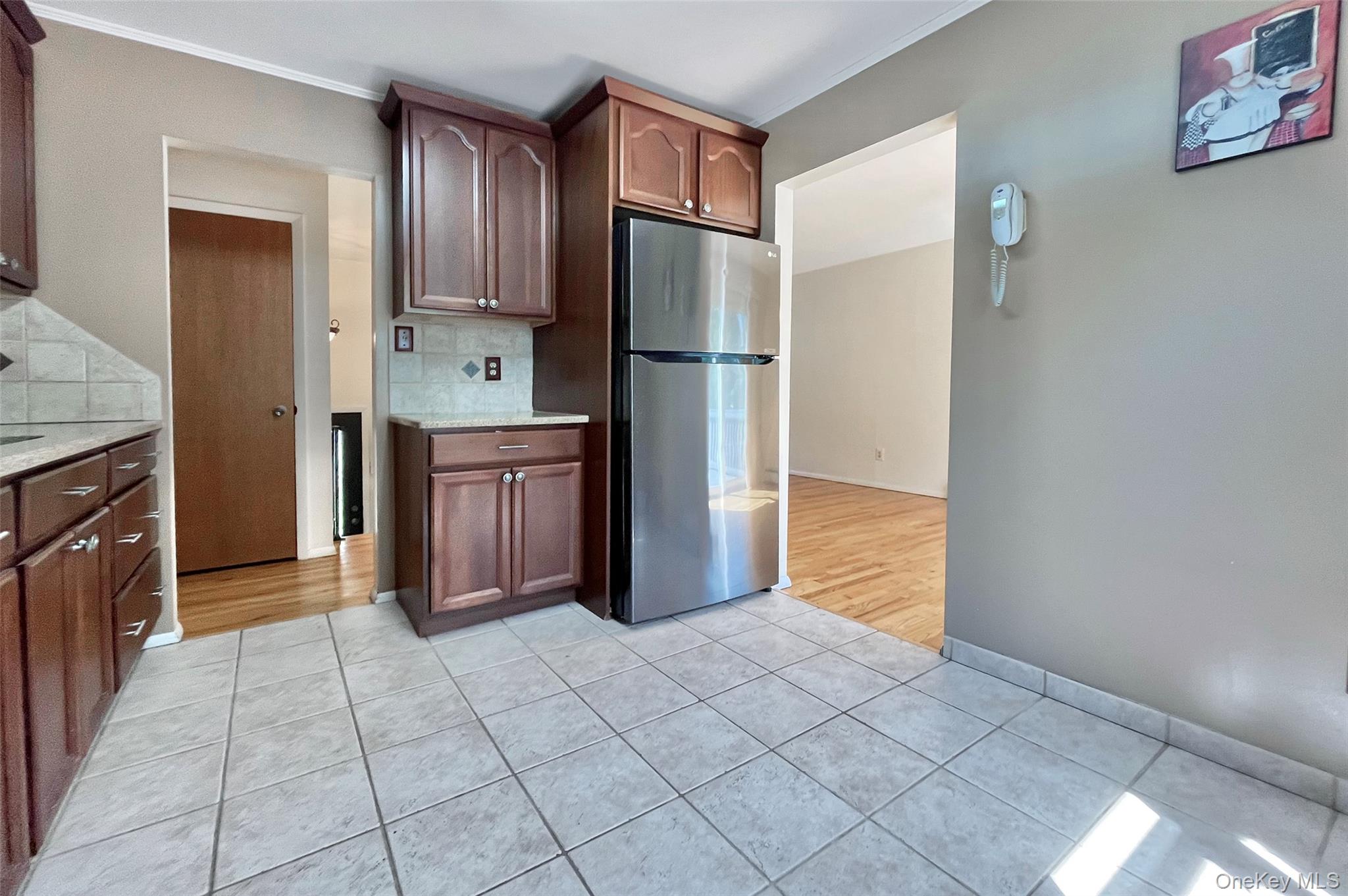 554 High Street Monroe, NY 10950 - Photo 17 of 29 a kitchen with granite countertop a refrigerator and a stove top oven