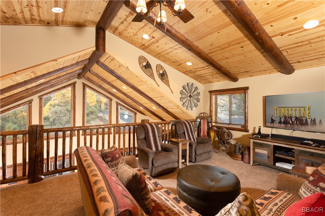 1389 Flintridge Avenue Big Bear City, CA 92314 - Photo 14 of 21 a living room with furniture and a floor to ceiling window