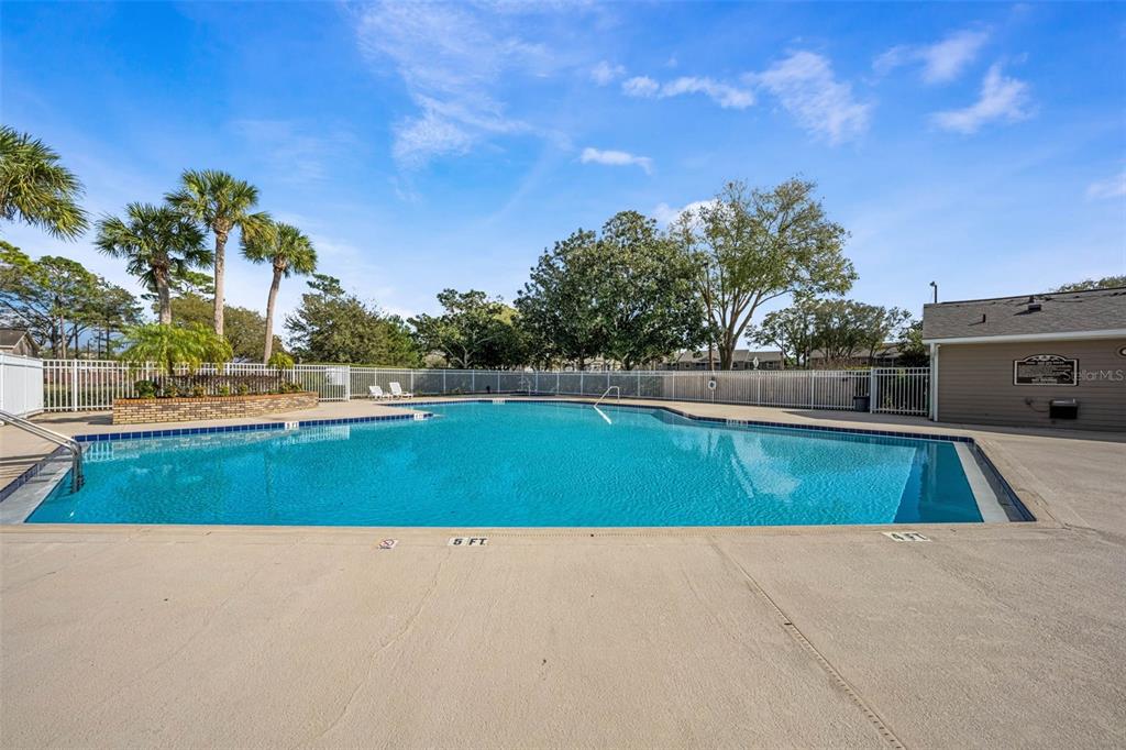 112 Reserve Circle, Unit 212 Oviedo, FL 32765 - Photo 29 of 54 a view of a backyard