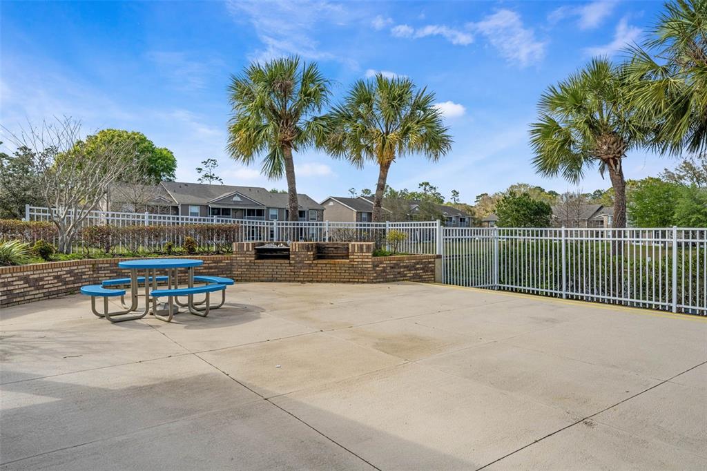 112 Reserve Circle, Unit 212 Oviedo, FL 32765 - Photo 31 of 54 a view of outdoor space with swimming pool and seating
