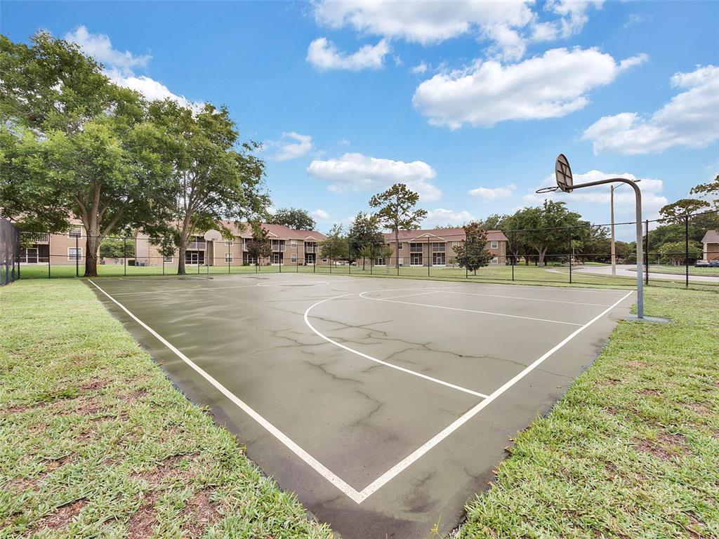 112 Reserve Circle, Unit 212 Oviedo, FL 32765 - Photo 35 of 54 a view of a tennis court