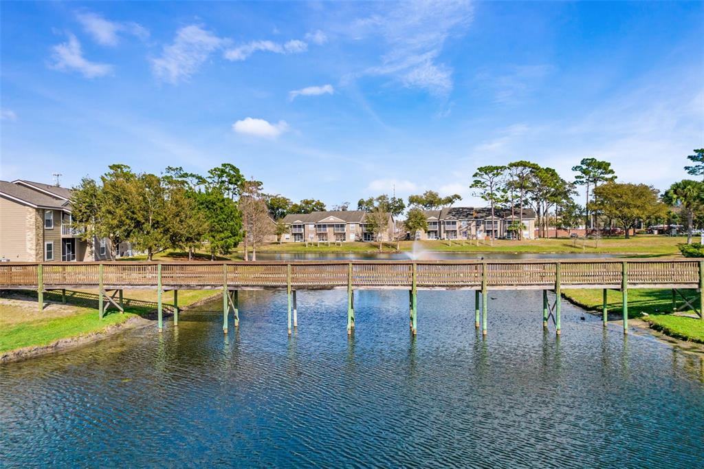 112 Reserve Circle, Unit 212 Oviedo, FL 32765 - Photo 37 of 54 a view of a swimming pool with an outdoor seating