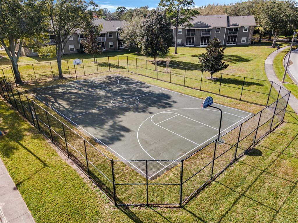 112 Reserve Circle, Unit 212 Oviedo, FL 32765 - Photo 42 of 54 a view of a swimming pool with a patio