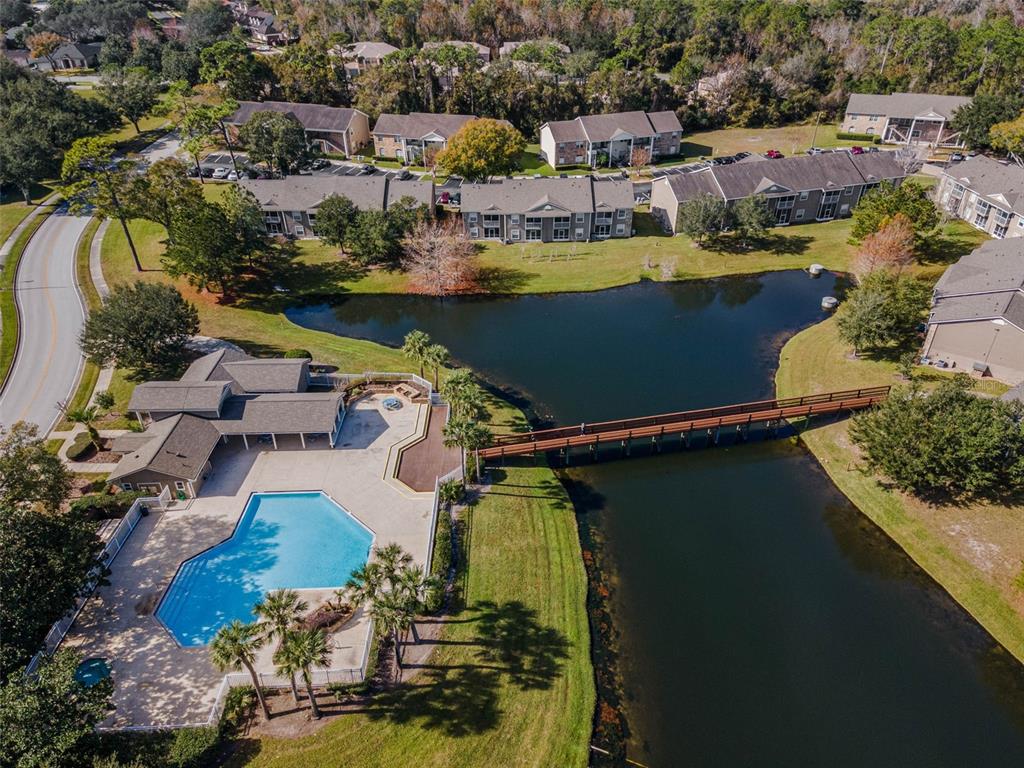 112 Reserve Circle, Unit 212 Oviedo, FL 32765 - Photo 48 of 54 an aerial view of a house with a lake view