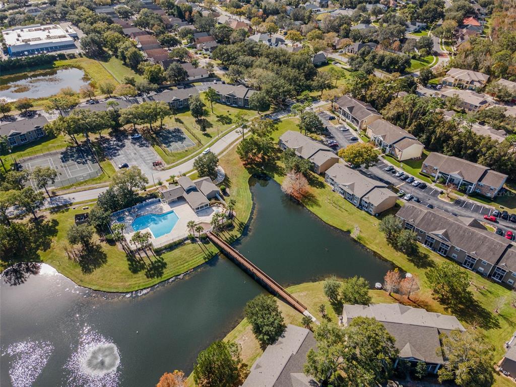112 Reserve Circle, Unit 212 Oviedo, FL 32765 - Photo 50 of 54 an aerial view of residential houses with outdoor space