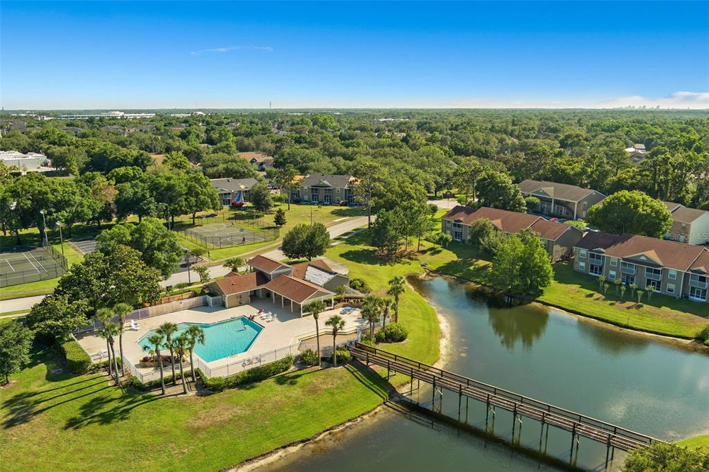 112 Reserve Circle, Unit 212 Oviedo, FL 32765 - Photo 51 of 54 a view of a lake with a city