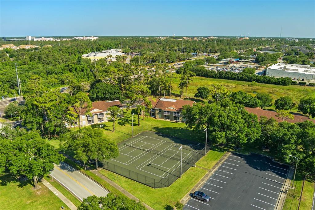 112 Reserve Circle, Unit 212 Oviedo, FL 32765 - Photo 53 of 54 an aerial view of residential houses with outdoor space and swimming pool