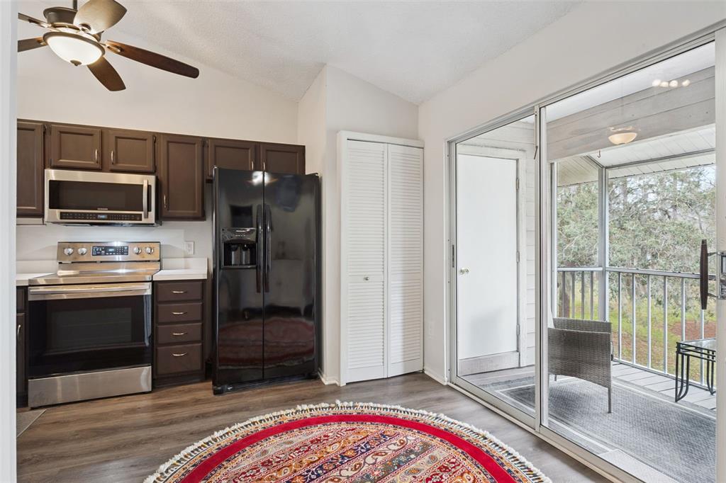 112 Reserve Circle, Unit 212 Oviedo, FL 32765 - Photo 9 of 54 a bedroom with a bed and a television