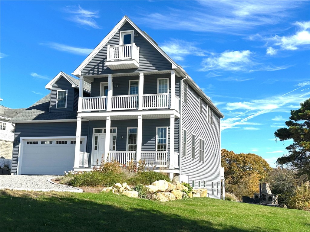 17 Moonlight Drive Westerly, RI 02891 - Photo 4 of 50 Side looking at backyard fireplace