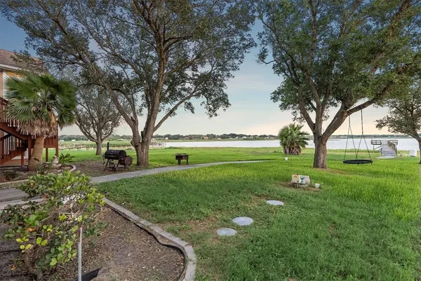 a view of backyard with green space