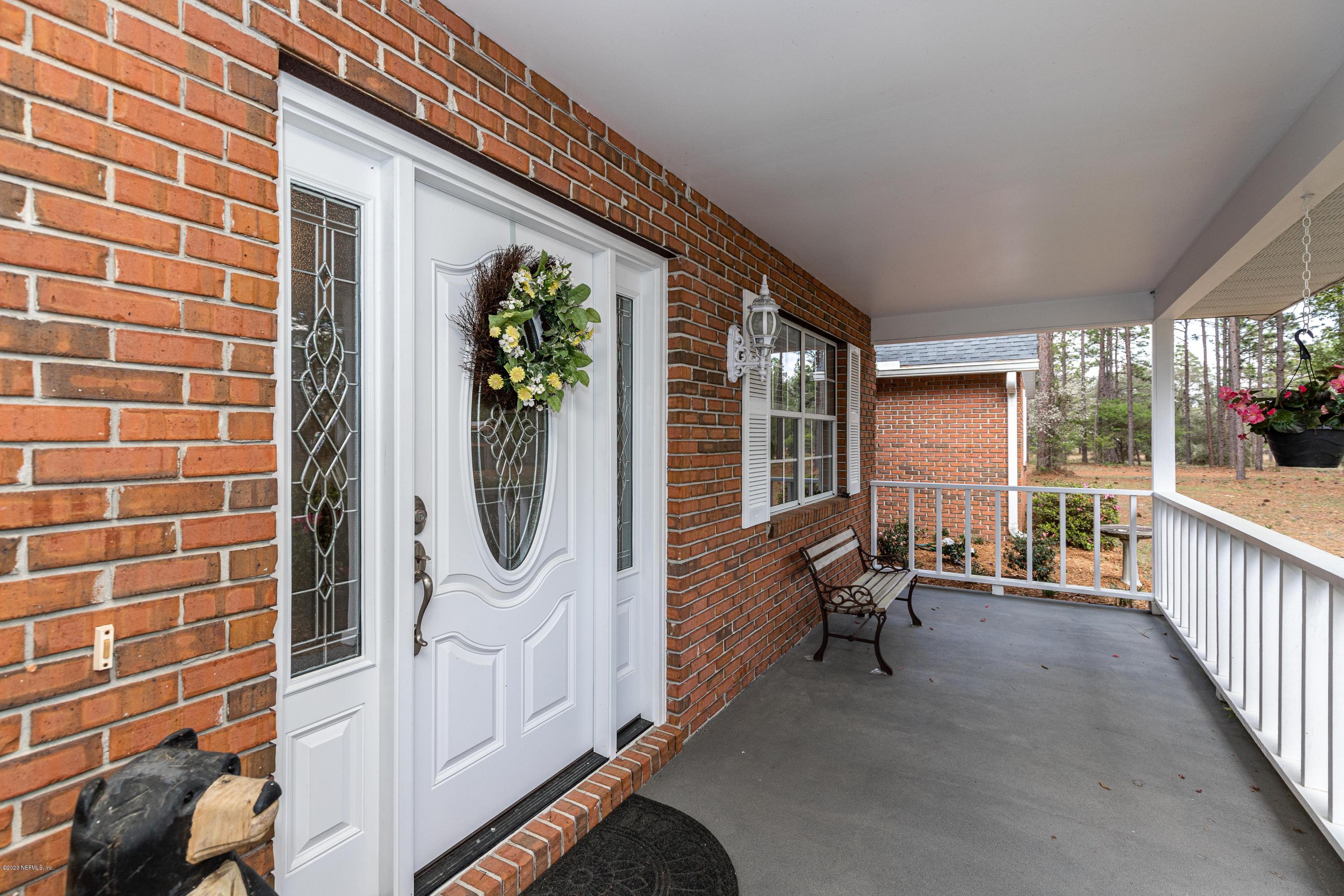 7750 Ranchette Road Keystone Heights, FL 32656 - Photo 6 of 70 Front Porch View 2