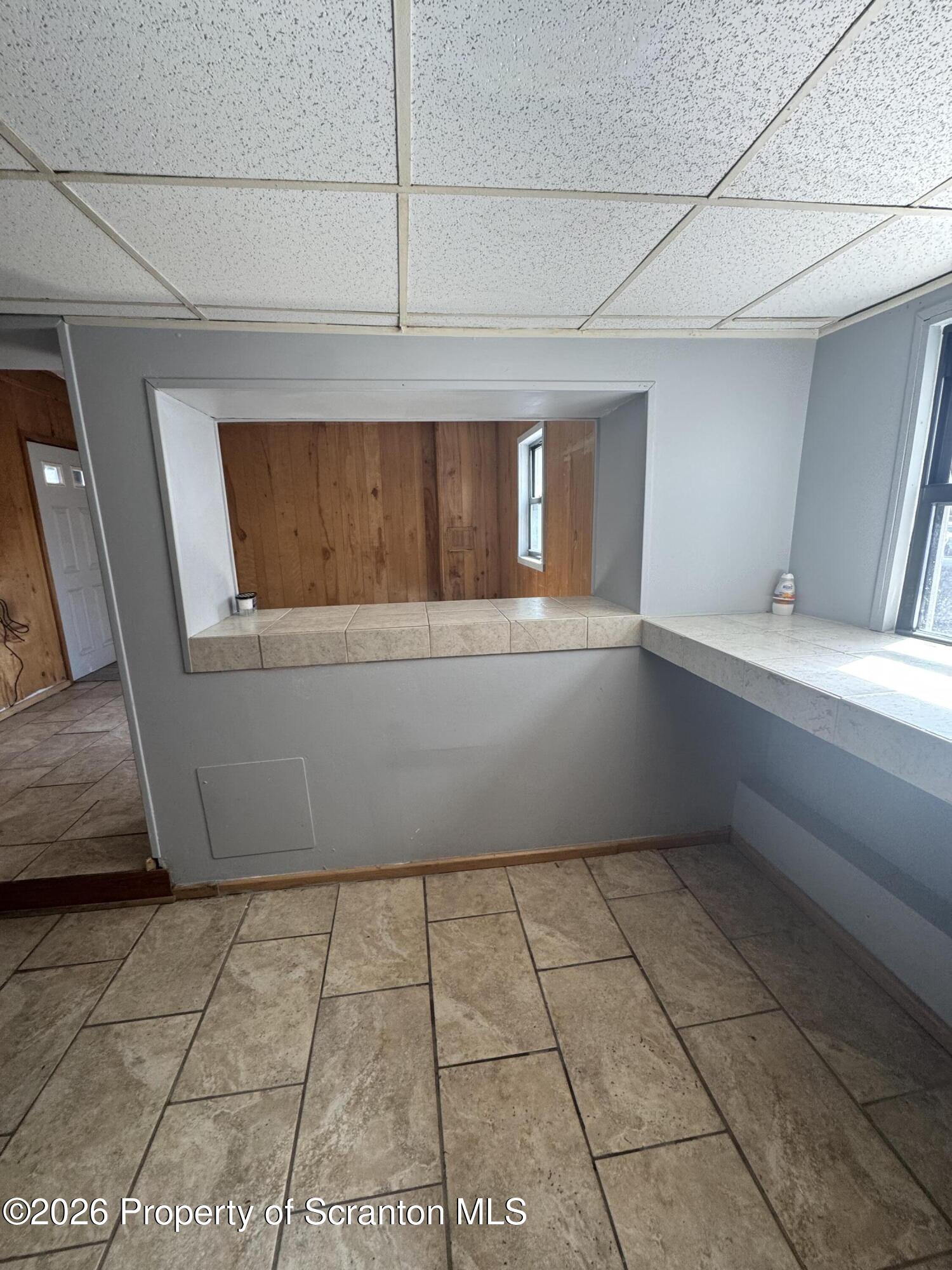 906 West Market Street Scranton, PA 18508 - Photo 6 of 10 a view of an empty room with a window