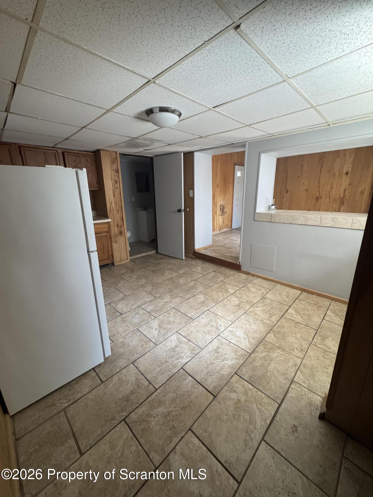906 West Market Street Scranton, PA 18508 - Photo 7 of 10 a view of a livingroom with an empty space and a window