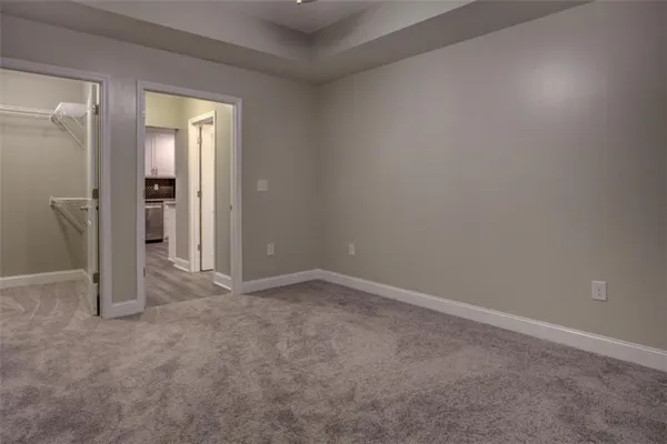 a kitchen with a sink and a refrigerator