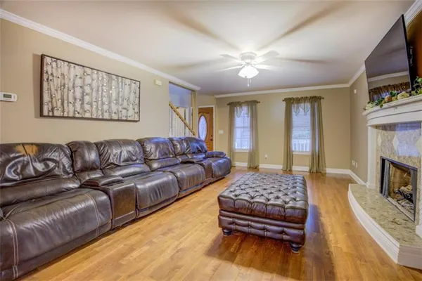 a view of fireplace and wooden floor