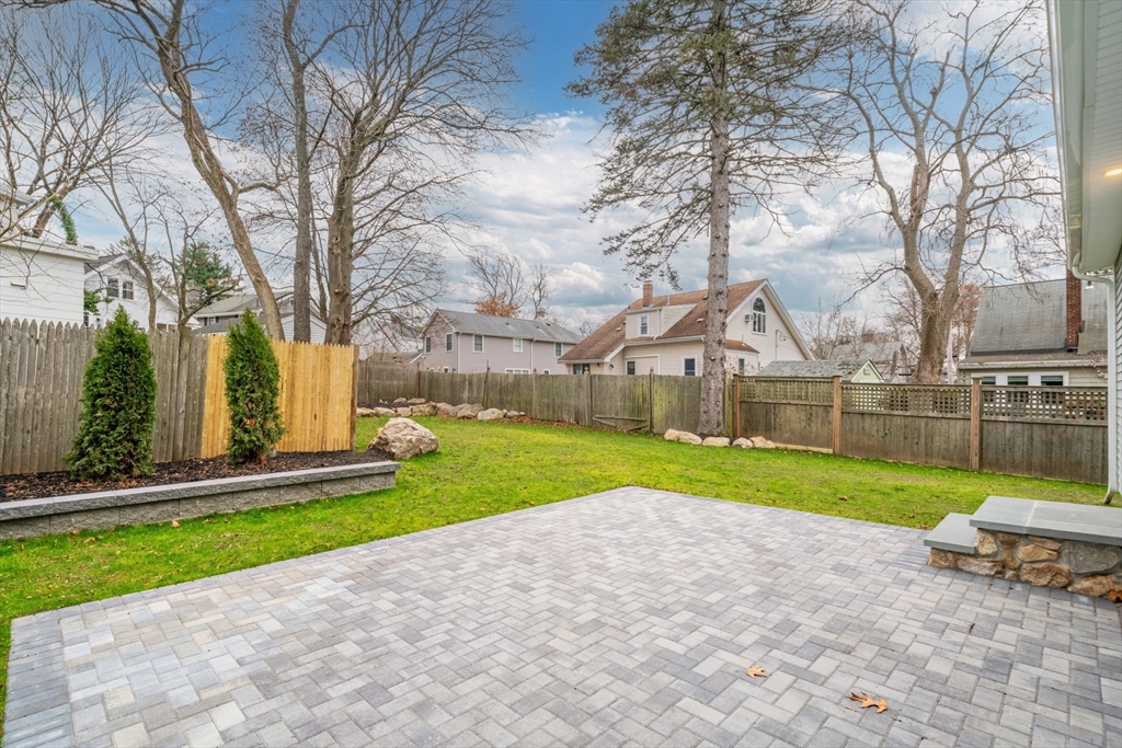 56 Valentine Road Arlington, MA 02476 - Photo 3 of 42 a view of a park with large trees