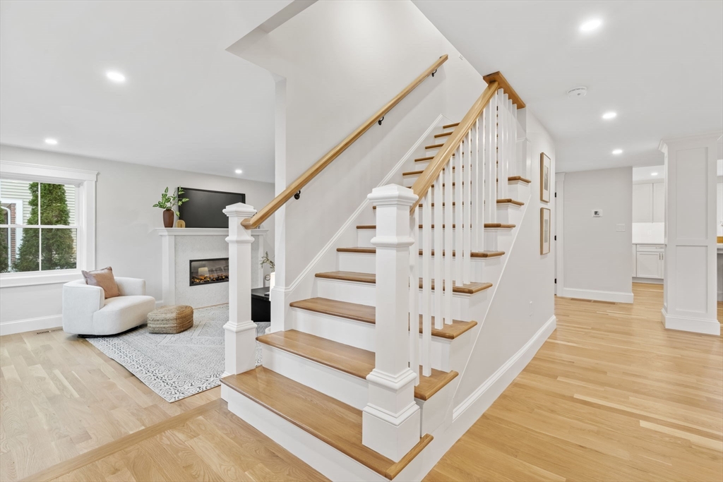 56 Valentine Road Arlington, MA 02476 - Photo 5 of 42 a view of entryway and hall with wooden floor