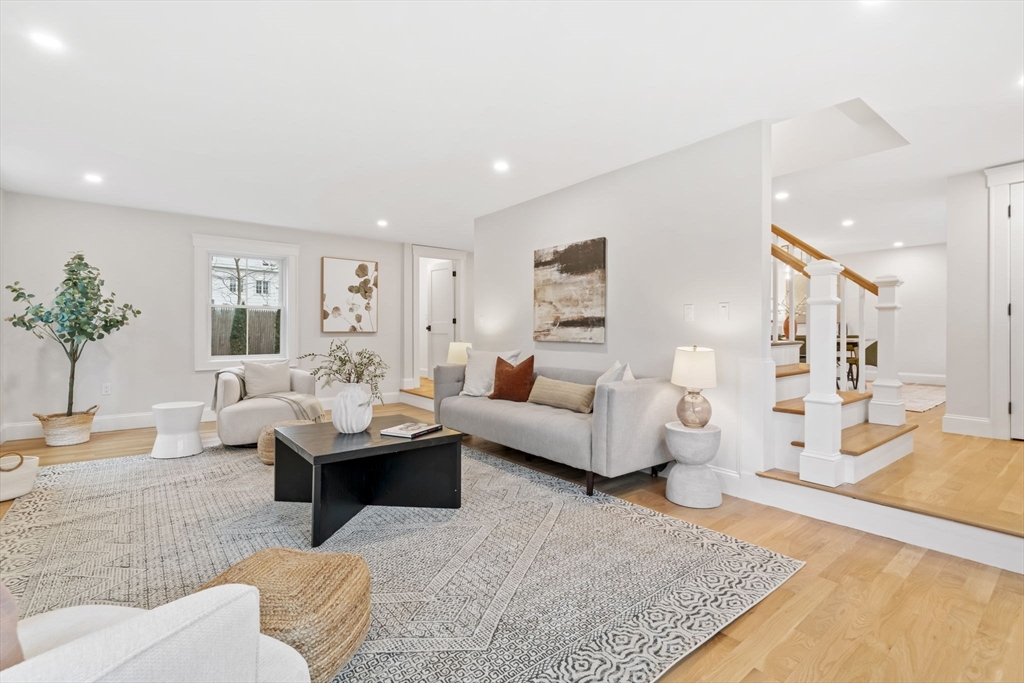 56 Valentine Road Arlington, MA 02476 - Photo 6 of 42 a living room with furniture and a couch