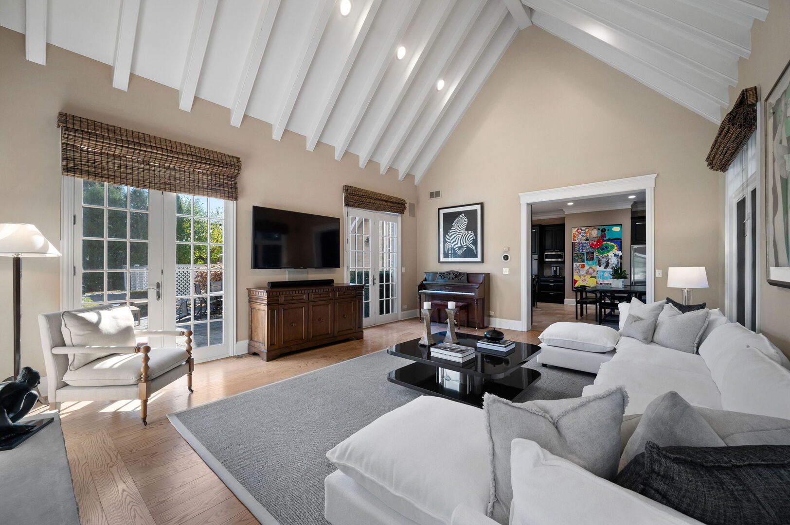 677 Greenleaf Avenue Glencoe, IL 60022 - Photo 19 of 54 a living room with furniture and a flat screen tv