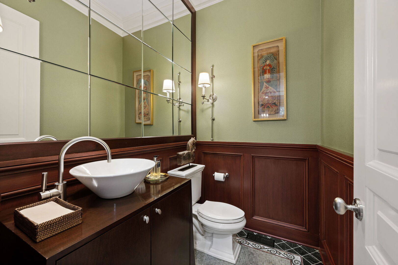 677 Greenleaf Avenue Glencoe, IL 60022 - Photo 20 of 54 a bathroom with a toilet sink and mirror